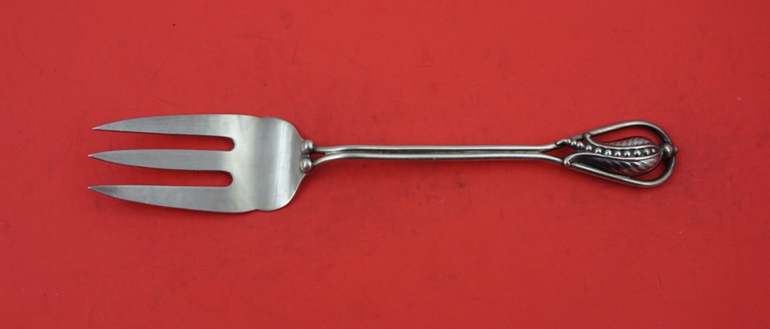 Carl Poul Petersen Peapod Sterling Silver 3-Tine Cold Meat Fork 8.5": Carl Poul Petersen Peapod Sterling Silver 3-Tine Cold Meat Fork 8.5" Elevate your dining experience with this exquisite Peapod serving fork by Carl Poul Petersen. Crafted from high-quality sterling si