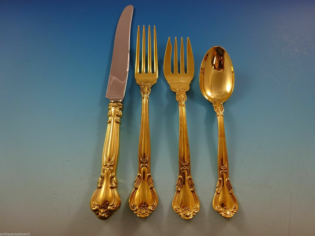 Chantilly Gold by Gorham Sterling Silver 4-Piece Place Setting: Chantilly Gold by Gorham Sterling Silver 4-Piece Place Setting Enhance your dining experience with this exquisite Chantilly Gold by Gorham sterling silver place setting. Crafted during the period of 1
