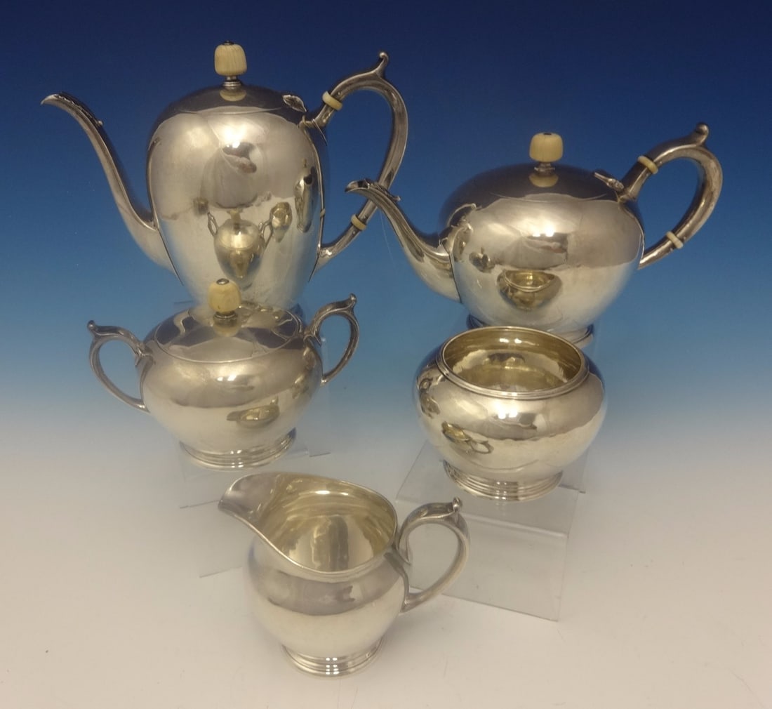 Arthur Stone 5 Piece Sterling Silver Handwrought Tea Set 1930s Arts & Crafts: Arthur Stone 5 Piece Sterling Silver Handwrought Tea Set 1930s Arts & Crafts This exquisite 5-piece tea set crafted from sterling silver by Arthur Stone showcases the exceptional handwrought craftsman