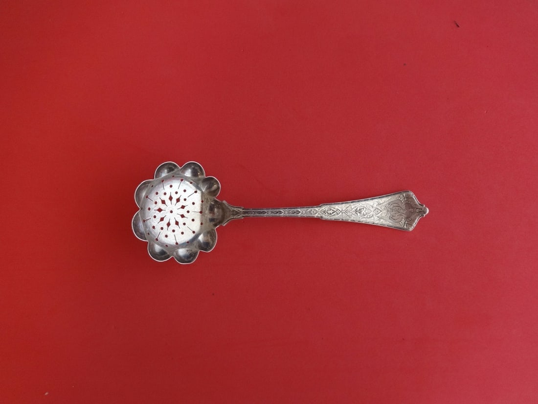 Tiffany & Co. Persian Sterling Silver Sugar Sifter 7.25 In: Tiffany & Co. Persian Sterling Silver Sugar Sifter 7.25 In This exquisite sugar sifter from Tiffany & Co. is crafted in sterling silver and features the elegant Persian pattern. Measuring 7 1/4 inches