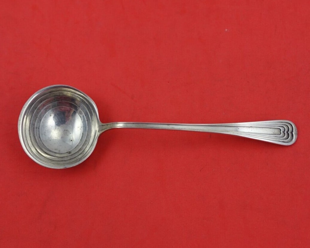 International Sterling Silver Ripple Sauce Ladle 5.5 Unusual Design: International Sterling Silver Ripple Sauce Ladle 5.5 Unusual Design Discover the exquisite Ripple sauce ladle from International Sterling, measuring 5 1/2 inches. Crafted from high-quality sterling si