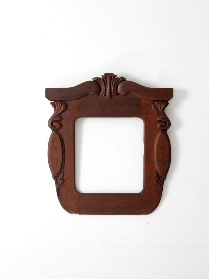 Art Nouveau Late 19th Century Carved Wood Frame with Central Arch: Art Nouveau Late 19th Century Carved Wood Frame with Central Arch This antique carved frame is a stunning representation of Art Nouveau design from the late 19th century. It is crafted from rich, dark