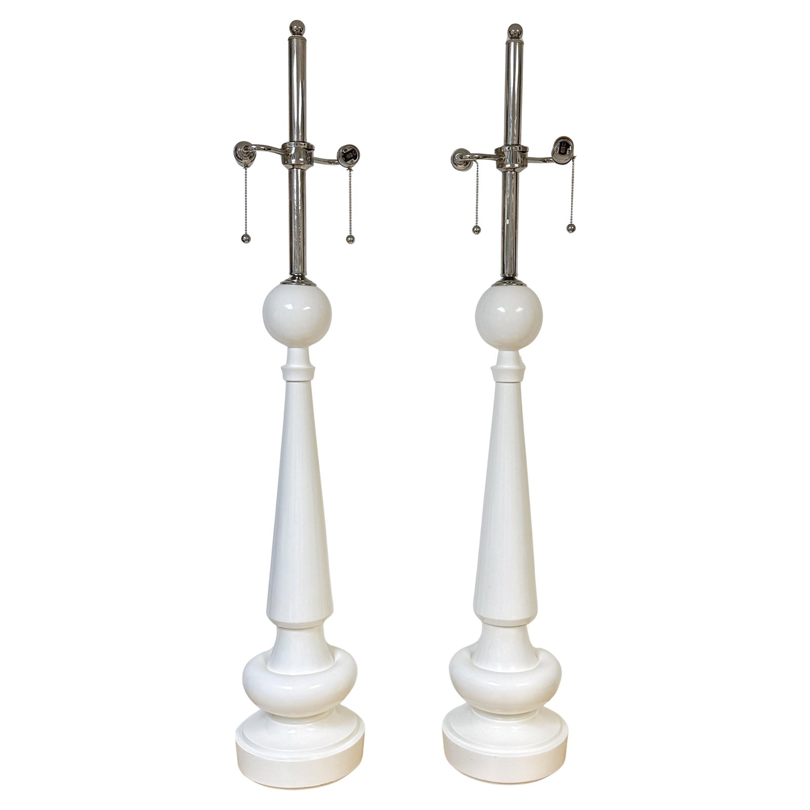 Set of 2 Tall White Lacquered Wood and Nickel Midcentury Sculptural Table Lamps: Set of 2 Tall White Lacquered Wood and Nickel Midcentury Sculptural Table Lamps This pair of monumental Mid-Century Modern table lamps features sculptural forms crafted from carved wood, finished in a