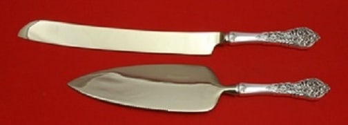 Reed and Barton Florentine Lace Sterling Wedding Cake Set 2-Pc: Reed and Barton Florentine Lace Sterling Wedding Cake Set 2-Pc This exquisite 2-piece wedding cake set, crafted by Reed & Barton, features the elegant Florentine Lace pattern. Made of sterling silver,