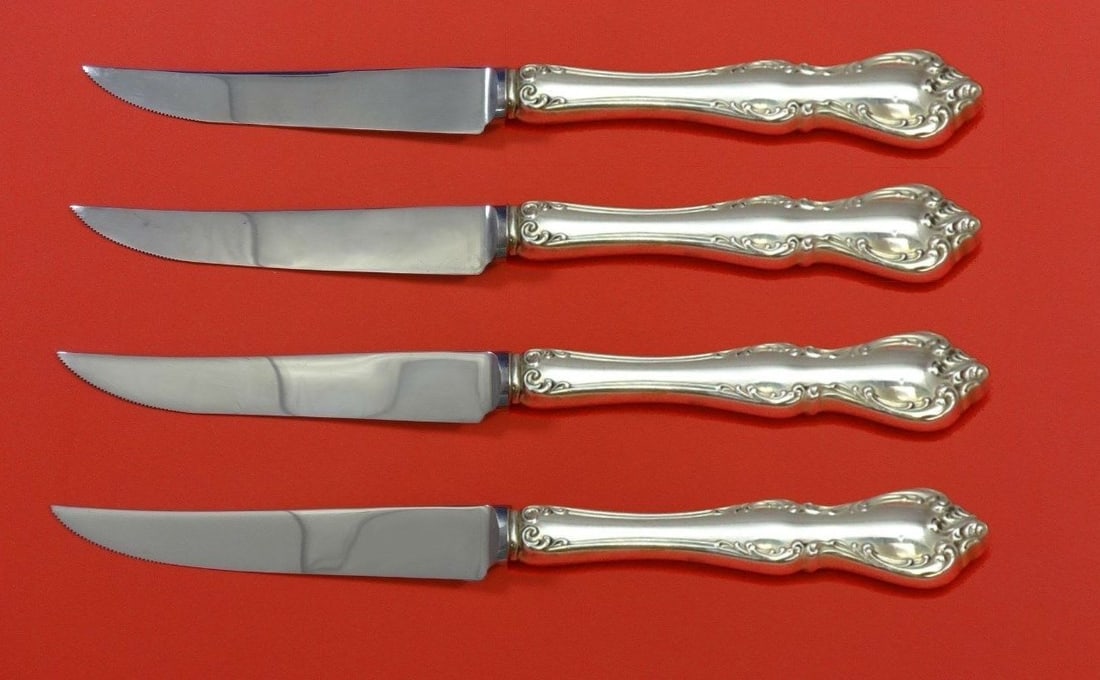 Towle Debussy Sterling Silver Steak Knife Set 4pc Custom Made 8.5": Towle Debussy Sterling Silver Steak Knife Set 4pc Custom Made 8.5" This exquisite 4-piece steak knife set from Towle features the elegant Debussy pattern. Crafted from high-quality sterling silver, ea