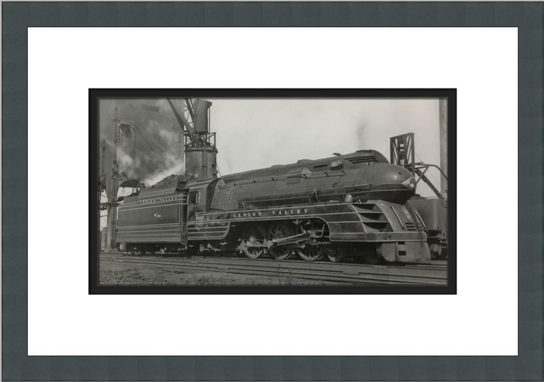 Lehigh Valley Railroad Locomotive #2097 Lithograph Print Custom Framed: Lehigh Valley Railroad Locomotive #2097 Lithograph Print Custom Framed This custom framed calendar print features the Lehigh Valley Railroad Steam Locomotive #2097, capturing the essence of Americana