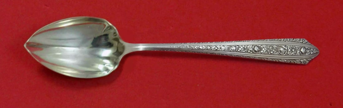Wallace Normandie Sterling Silver Fluted Grapefruit Spoon 5 3/4": Wallace Normandie Sterling Silver Fluted Grapefruit Spoon 5 3/4" This exquisite grapefruit spoon features the Normandie pattern by Wallace, crafted from high-quality sterling silver. Measuring 5 3/4 i