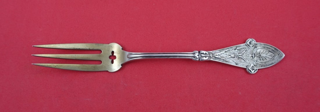 Sterling Silver 3-Tine Citrus Fork Italian Pattern by Tiffany Gold Washed 6 1/4": Sterling Silver 3-Tine Citrus Fork Italian Pattern by Tiffany Gold Washed 6 1/4" This is a Tiffany & Co. sterling silver citrus fork in the Italian pattern, featuring a flat handle design. The fork ha