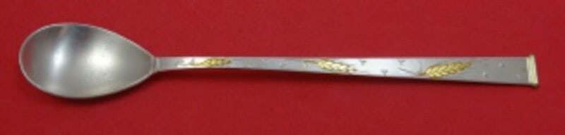 Gorham Golden Wheat Sterling Silver Iced Tea Spoon 7 5/8": Gorham Golden Wheat Sterling Silver Iced Tea Spoon 7 5/8" This exquisite iced tea spoon from Gorham features the elegant Golden Wheat pattern, crafted from high-quality sterling silver. Measuring 7 5/