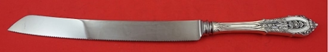 Wallace Rose Point Sterling Silver Wedding Cake Knife 12.5": Wallace Rose Point Sterling Silver Wedding Cake Knife 12.5" This exquisite wedding cake knife features a hollow handle crafted from sterling silver, showcasing the elegant Rose Point pattern by Wallac