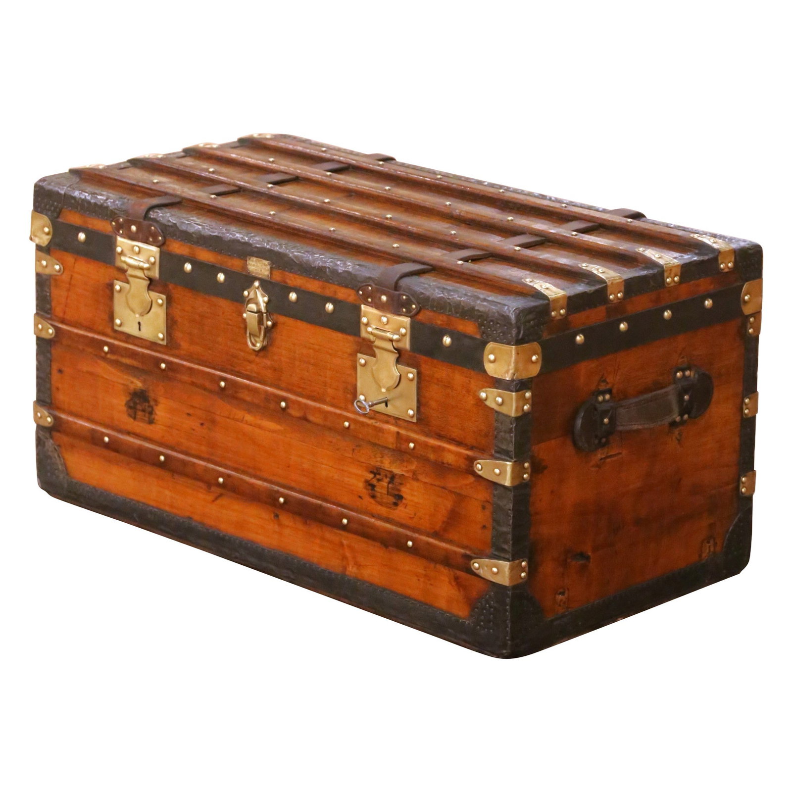 Belle Epoque Paris Poplar Travel Trunk Coffee Table with Brass and Iron Details: Belle Epoque Paris Poplar Travel Trunk Coffee Table with Brass and Iron Details This late 19th-century French Parisian travel trunk features original brass and iron hardware, handcrafted from poplar w