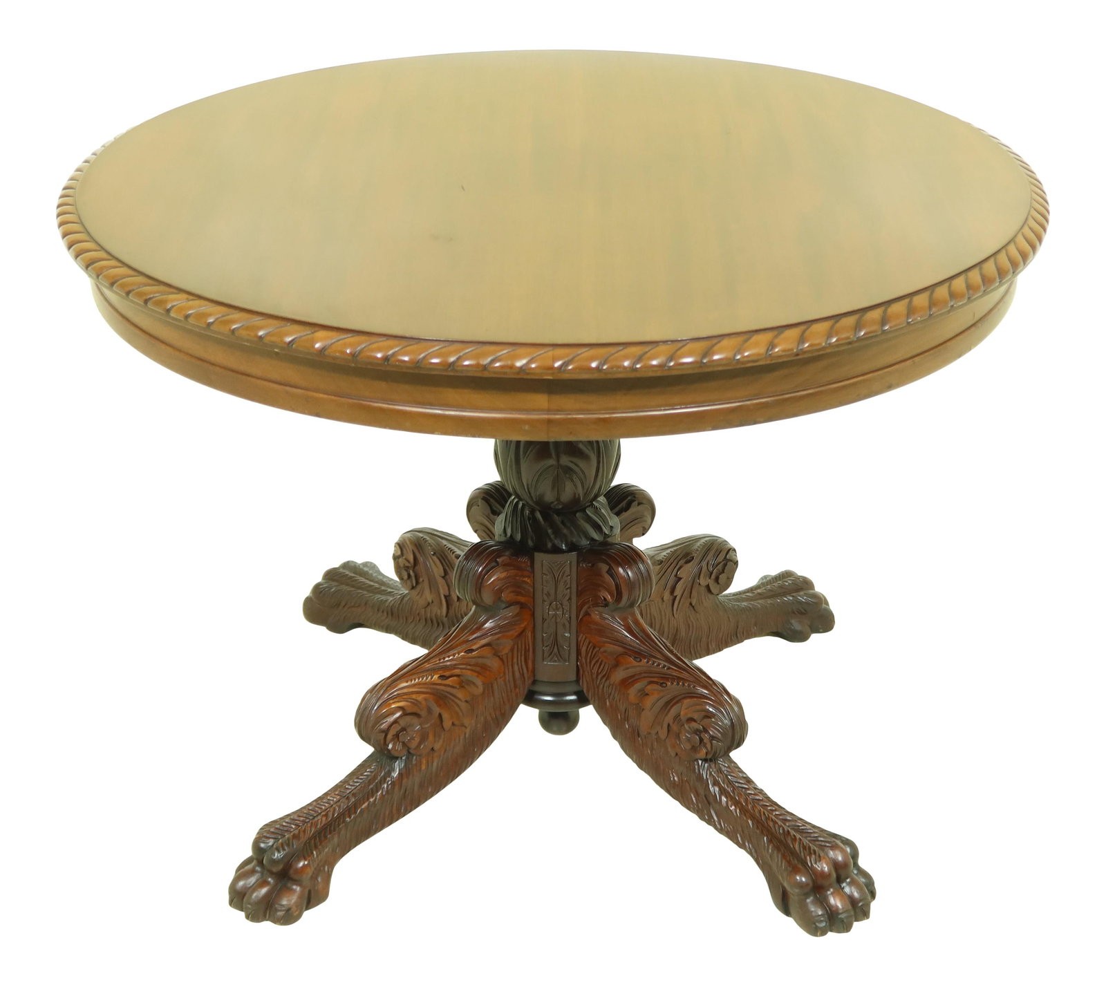 1880s Antique Round Mahogany Pedestal Table with Carved Paw Feet: 1880s Antique Round Mahogany Pedestal Table with Carved Paw Feet This exquisite Antique American Carved Round Mahogany Paw Foot Pedestal Table, dating back to the 1880s, showcases fine carved details