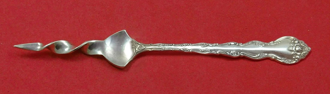 Feliciana by Wallace Sterling Silver Twisted Butter Pick 5 3/4": Feliciana by Wallace Sterling Silver Twisted Butter Pick 5 3/4" Introducing the Feliciana Butter Pick, expertly crafted by Wallace. This custom-made butter pick features a twisted design and measures