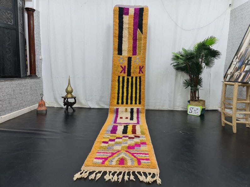 Authentic Handwoven Berber Runner Rug 2 x 10 Feet Morocco: Authentic Handwoven Berber Runner Rug 2 x 10 Feet Morocco This Lovely Authentic Runner Rug is a stunning piece, handwoven in the Atlas Mountains by skilled local Berber women weavers. Crafted with tra