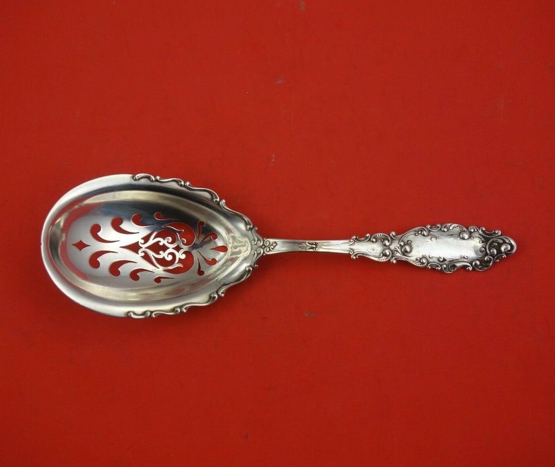 Gorham Luxembourg Sterling Silver Ice Spoon 8 3/4 Inches with Lacing: Gorham Luxembourg Sterling Silver Ice Spoon 8 3/4 Inches with Lacing This exquisite ice spoon from the Luxembourg pattern by Gorham is crafted from high-quality sterling silver. Measuring 8 3/4 inches