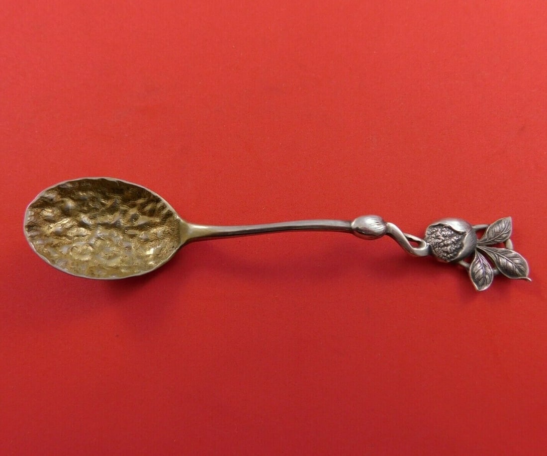 Shiebler Sterling Silver Gold Washed Nutmeg Spoon 4 5/8" Figural: Shiebler Sterling Silver Gold Washed Nutmeg Spoon 4 5/8" Figural This exquisite nutmeg spoon from Shiebler is crafted from sterling silver and features a luxurious gold wash. Measuring 4 5/8 inches in