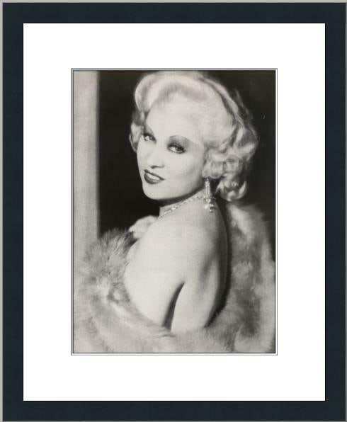 Mae West Licensed Reprint Custom Framed Art Print Portrait: Mae West Licensed Reprint Custom Framed Art Print Portrait This striking black and white print of Mae West is a captivating piece of art that showcases the iconic figure in a modern style. The print i