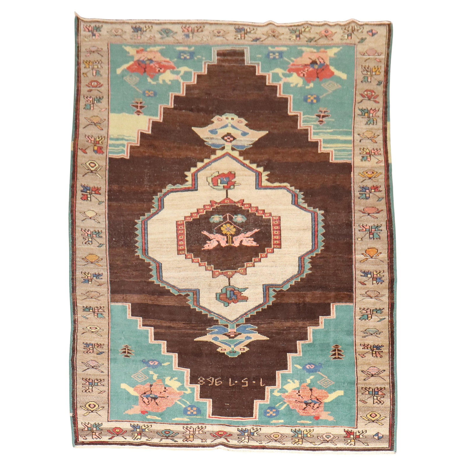 1968 Turkish Kars Rug with Floral Medallion Design 6'9" x 9'2": 1968 Turkish Kars Rug with Floral Medallion Design 6'9" x 9'2" This Turkish Kars rug from 1968 features a floral medallion design in brown and pistachio tones. Hand-knotted from wool, it showcases an