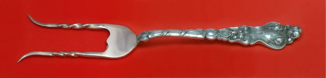 Unger Douvaine Sterling Silver Custom Serving Fork 6 3/4": Unger Douvaine Sterling Silver Custom Serving Fork 6 3/4" This Douvaine by Unger serving fork is a stunning piece crafted from high-quality sterling silver. Measuring 6 3/4 inches, this custom-made fo
