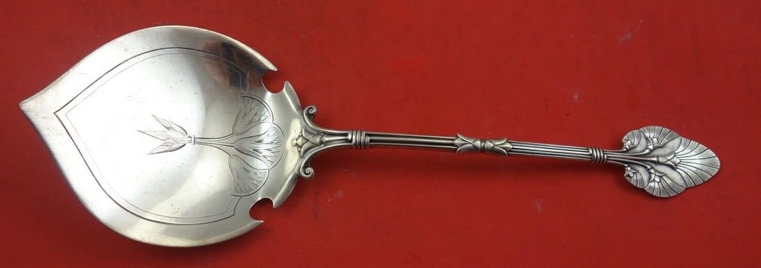 Gorham Lotus 9 Inch Sterling Silver Buckwheat Server with Engraved Blossoms: Gorham Lotus 9 Inch Sterling Silver Buckwheat Server with Engraved Blossoms This exquisite 9" buckwheat server from Gorham's Lotus pattern features beautifully engraved lotus blossoms on the serving a