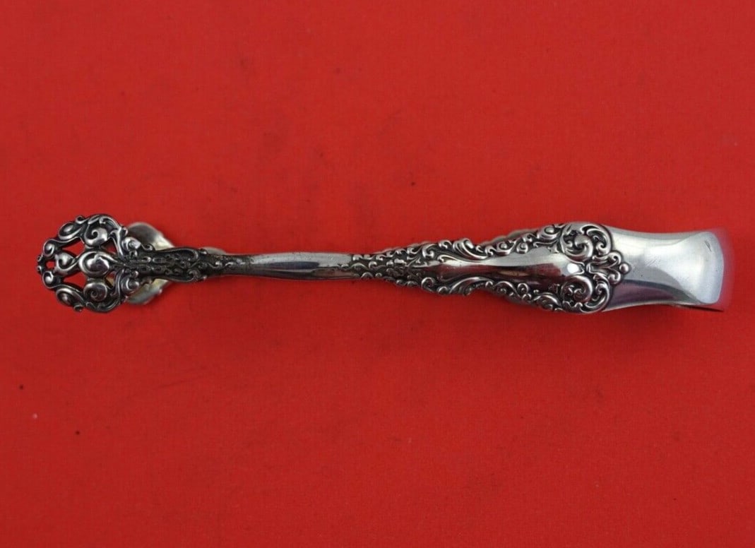International Silver Revere Pattern 4 Inch Sterling Silver Sugar Tong: International Silver Revere Pattern 4 Inch Sterling Silver Sugar Tong This exquisite sugar tong from the Revere pattern by International Sterling is crafted from high-quality sterling silver. Measurin