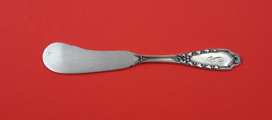 Lunt Sterling Silver John Hancock Butter Spreader 5 3/8": Lunt Sterling Silver John Hancock Butter Spreader 5 3/8" Introducing the John Hancock Butter Spreader by Lunt, a beautifully crafted piece in sterling silver. This flat handle knife measures 5 3/8" an