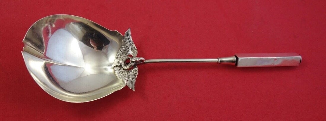 Gorham Isis Sterling Silver Berry Spoon 9 5/8 Inch Serving Spoon: Gorham Isis Sterling Silver Berry Spoon 9 5/8 Inch Serving Spoon Introducing the Isis Berry Spoon by Gorham, a stunning example of Egyptian Revival design. This sterling silver serving spoon, measurin
