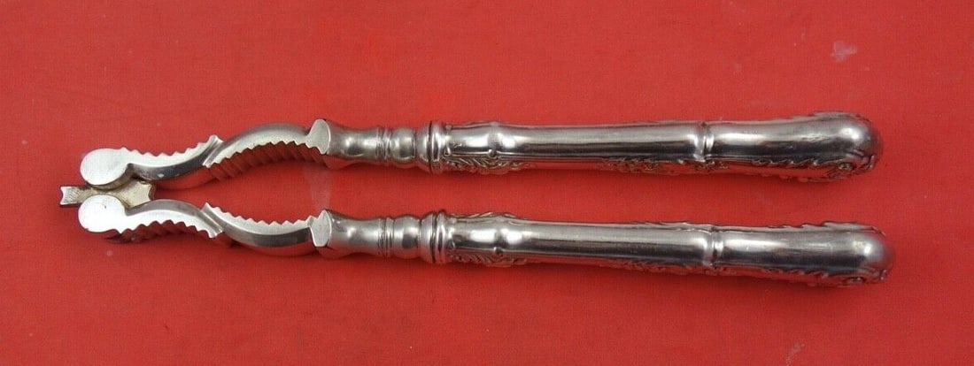 Gorham Regent Sterling Silver Nut Cracker with Monogram 6 3/4": Gorham Regent Sterling Silver Nut Cracker with Monogram 6 3/4" Enhance your dining experience with this exquisite Regent by Gorham Sterling Silver Nut Cracker. Crafted from high-quality sterling silve