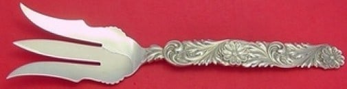 Shiebler Sterling Silver Serving Fork Flower Scroll Design 11.25": Shiebler Sterling Silver Serving Fork Flower Scroll Design 11.25" This exquisite serving fork showcases a stunning flower and scroll design, perfect for adding elegance to your dining experience. Craf