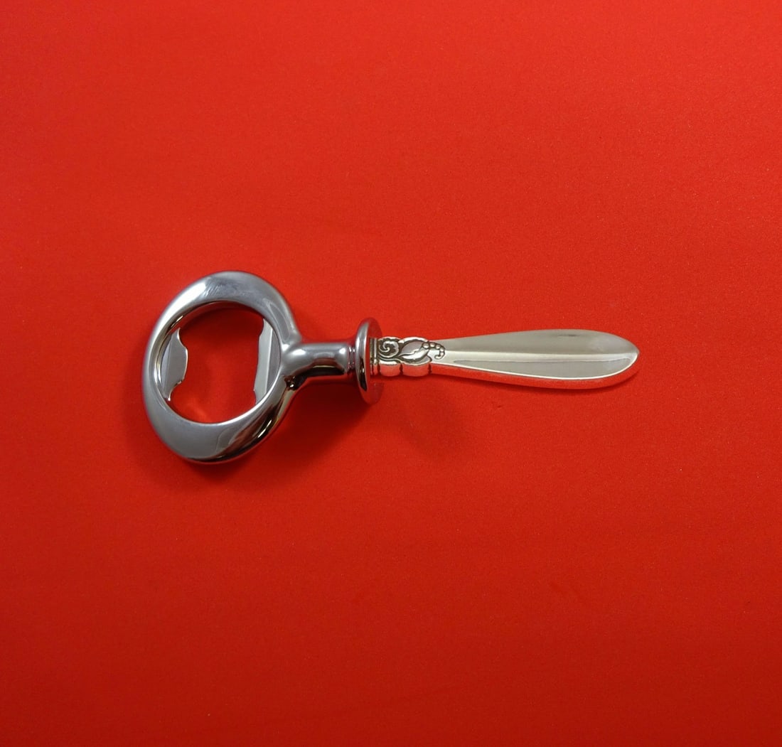 Frigast Princess Fuchsia Sterling Silver Custom Bottle Opener 6": Frigast Princess Fuchsia Sterling Silver Custom Bottle Opener 6" This exquisite bottle opener from Frigast features a stunning sterling silver hollow handle in the elegant "Princess Fuchsia" pattern.