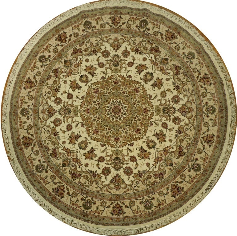 8.2 Feet Round Hand-Knotted Wool and Silk Rug: 8.2 Feet Round Hand-Knotted Wool and Silk Rug Free continental US Shipping This exquisite 8.2 x 8.2 feet round rug is a stunning blend of wool and silk, hand-knotted to perfection. The wool provides a