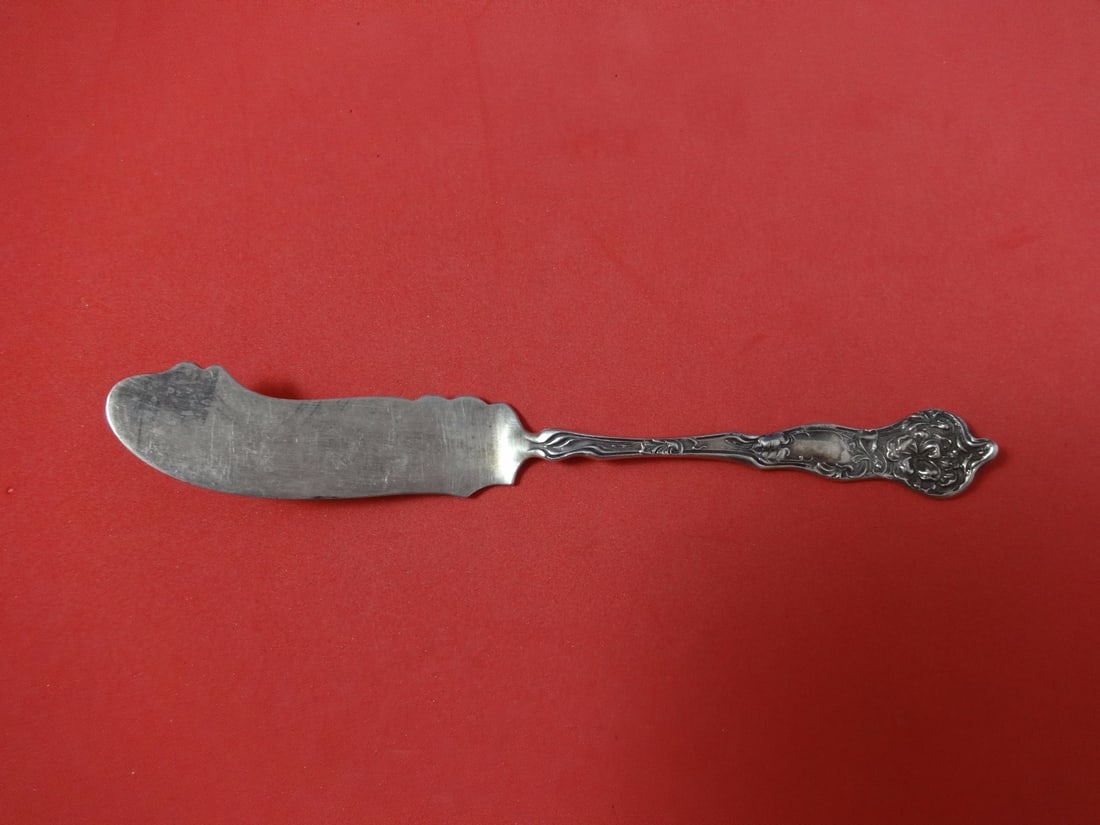 Fiorito Shiebler Sterling Silver Master Butter Knife 6.5 Inch: Fiorito Shiebler Sterling Silver Master Butter Knife 6.5 Inch This exquisite Master Butter Flat Handle, measuring 6 1/2 inches, is crafted from high-quality sterling silver and features the elegant Fi