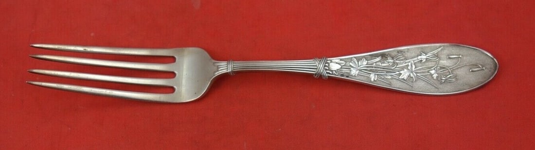 Sterling Silver Fork 7 1/8 Inch Honeysuckle Pattern by Whiting: Sterling Silver Fork 7 1/8 Inch Honeysuckle Pattern by Whiting This is a sterling silver regular fork in the Honeysuckle pattern by Whiting. Crafted in the United States between 1850 and 1899, this he