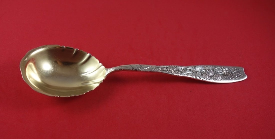 Whiting Berry Sterling Silver Serving Spoon Gold Washed 8 3/4 Inches: Whiting Berry Sterling Silver Serving Spoon Gold Washed 8 3/4 Inches This exquisite berry spoon from Whiting is crafted from sterling silver and features a beautiful gold wash finish. It measures 8 3/