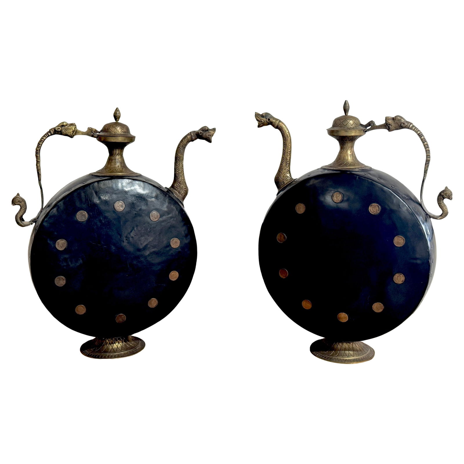 Set of 2 Anglo-Indian Brass Ewers with Black Enamel and British Coins: Set of 2 Anglo-Indian Brass Ewers with Black Enamel and British Coins This exquisite pair of Anglo-Indian cast and engraved brass ewers showcases a stunning combination of traditional craftsmanship an