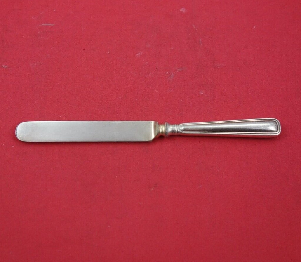 Birks Saxon Sterling Silver Dessert Knife 7 1/4 Inch: Birks Saxon Sterling Silver Dessert Knife 7 1/4 Inch Introducing the Saxon by Birks Sterling Silver Dessert Knife, a beautiful addition to your tableware collection. This exquisite dessert knife featu