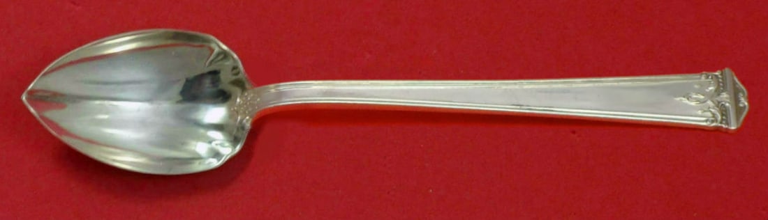 Trianon International Sterling Silver Fluted Grapefruit Spoon 5 3/4": Trianon International Sterling Silver Fluted Grapefruit Spoon 5 3/4" This exquisite grapefruit spoon is crafted from sterling silver and features a fluted design in the elegant Trianon pattern by Inte