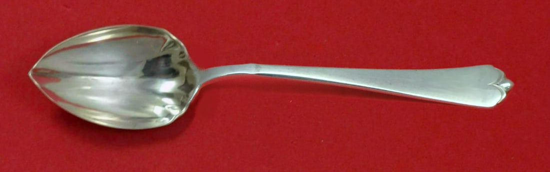 Watson Sterling Silver Custom Fluted Grapefruit Spoon Lotus Pattern 5 3/4": Watson Sterling Silver Custom Fluted Grapefruit Spoon Lotus Pattern 5 3/4" This exquisite grapefruit spoon is crafted from high-quality sterling silver by Watson, featuring a beautiful fluted design i