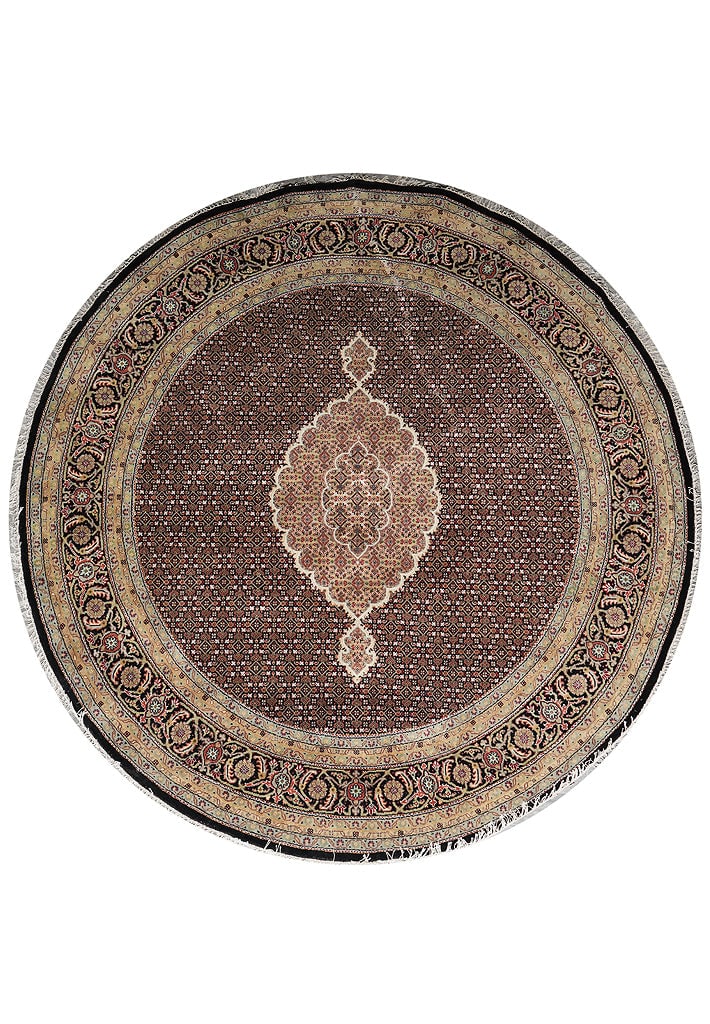 8 x 8 Round Hand-Knotted Wool Silk Mahi Tabriz Rug from India: 8 x 8 Round Hand-Knotted Wool Silk Mahi Tabriz Rug from India Free continental US Shipping This 8 x 8 foot round Mahi Tabriz rug is finely handmade in India using a premium blend of wool and silk. The