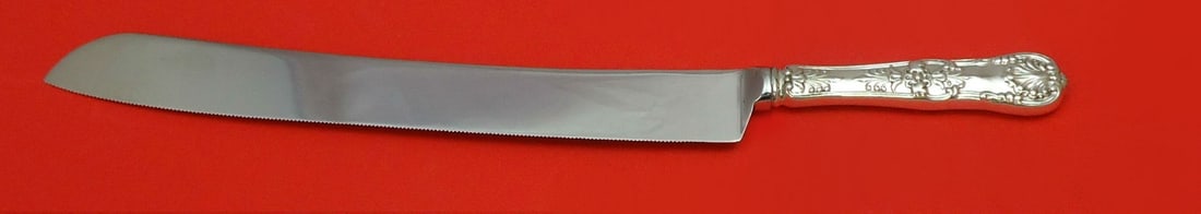 Tiffany & Co English King Sterling Silver Wedding Cake Knife 11 7/8": Tiffany & Co English King Sterling Silver Wedding Cake Knife 11 7/8" This exquisite wedding cake knife features the iconic English King pattern by Tiffany & Co. Crafted from sterling silver, it boasts