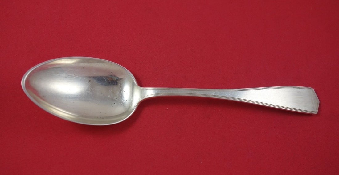 International Sterling Silver Scarsdale Serving Spoon 8.25": International Sterling Silver Scarsdale Serving Spoon 8.25" This exquisite serving spoon features the elegant Scarsdale pattern by International. Crafted from high-quality sterling silver, it measures