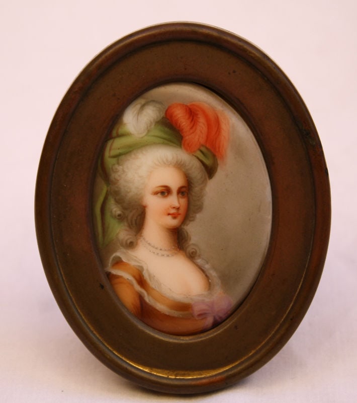 19th Century French Hand-Painted Porcelain Portrait of Queen: 19th Century French Hand-Painted Porcelain Portrait of Queen This exquisite 19th century French hand-painted porcelain piece features a formal portrait of a Queen, elegantly framed in its original bra