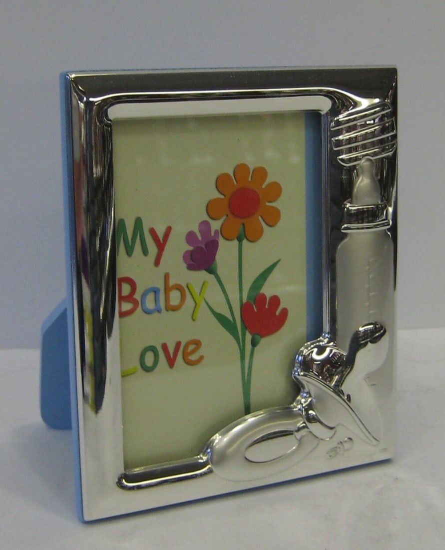 Trinity Italian 925 Silver Kids Picture Frame TNY2001C-1 with Bottle and Pacifier Designs: Trinity Italian 925 Silver Kids Picture Frame TNY2001C-1 with Bottle and Pacifier Designs Celebrate your child's special moments with this exquisite Fine Italian 925 Sterling Silver baby bottle and pa