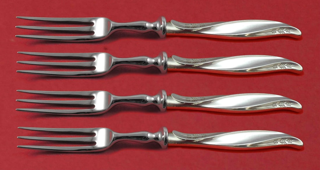 International Sterling Silver Pine Spray 4pc Fruit Fork Set 6": International Sterling Silver Pine Spray 4pc Fruit Fork Set 6" Enhance your dining experience with this exquisite 4-piece fruit fork set, featuring the elegant Pine Spray pattern by International Ster