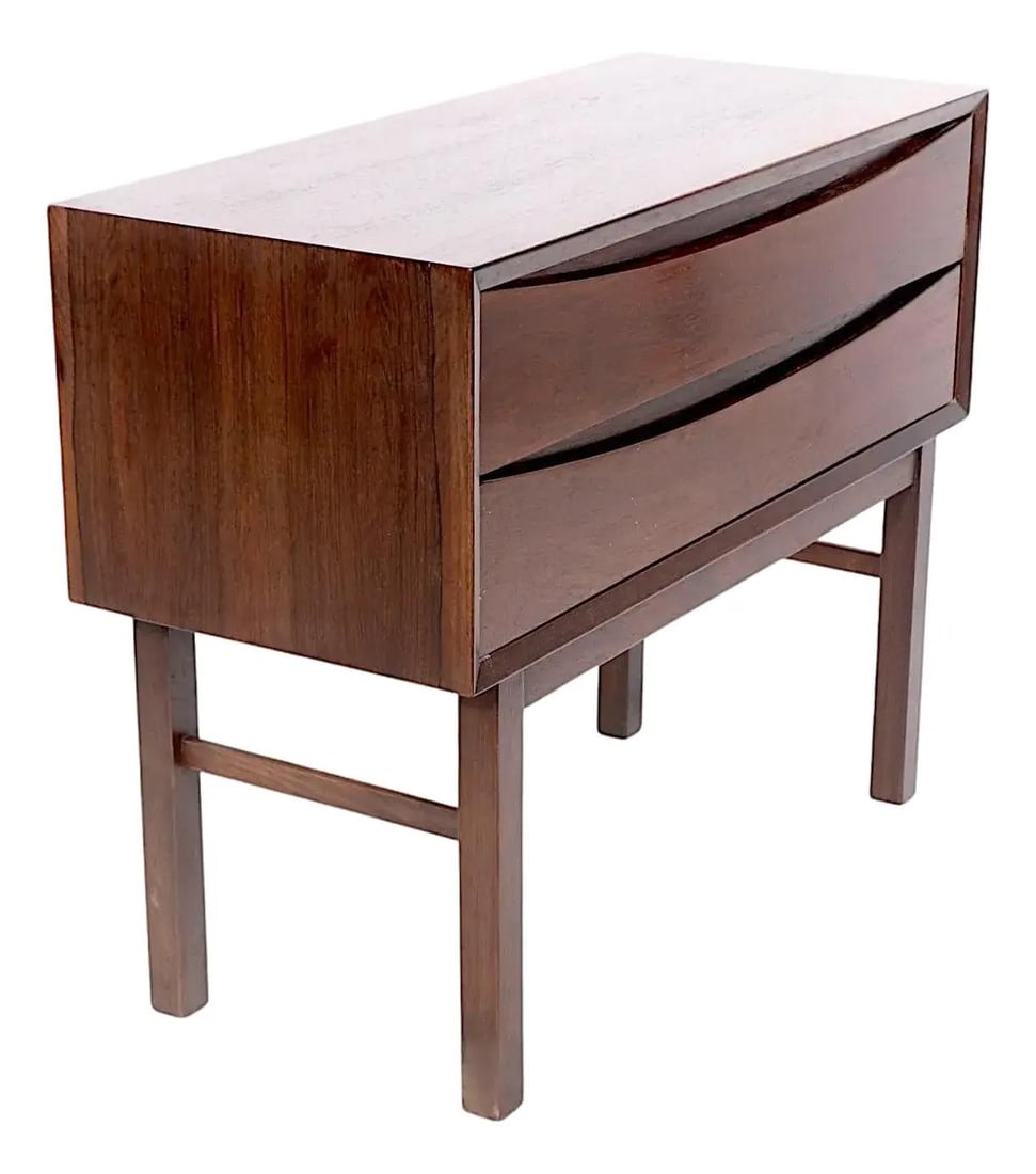 Mid Century Danish Modern Rosewood Nightstand with Two Drawers: Mid Century Danish Modern Rosewood Nightstand with Two Drawers This chic Mid Century Danish Modern nightstand features a beautiful rosewood veneer construction. It includes two pull-out drawers with e