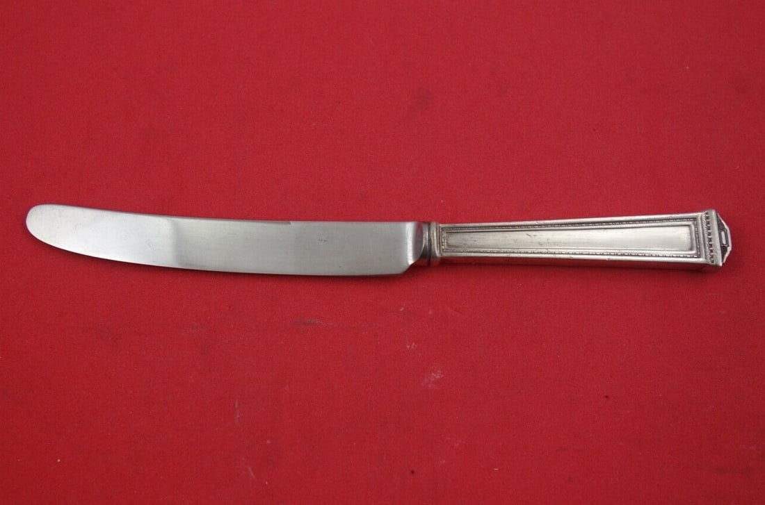 Pantheon International Sterling Silver Dessert Knife 7 1/8 inches: Pantheon International Sterling Silver Dessert Knife 7 1/8 inches Introducing the Pantheon dessert knife by International, a stunning piece of flatware that embodies timeless elegance. This exquisite