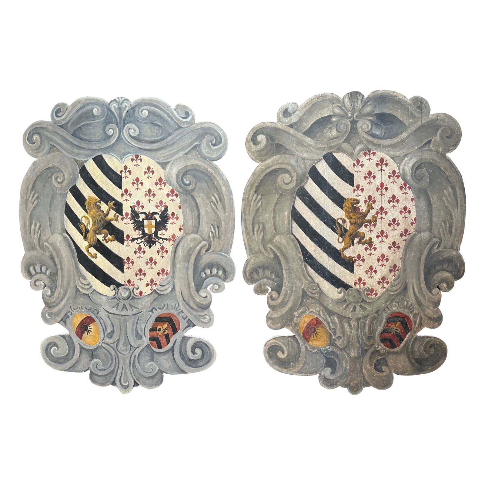 Antique Italian Baroque Wall Hanging Shields Set of 2 1920s: Antique Italian Baroque Wall Hanging Shields Set of 2 1920s Enhance your game room or study with this stunning pair of early 20th-century Italian wall hanging heraldic shields. Crafted in southern Ita