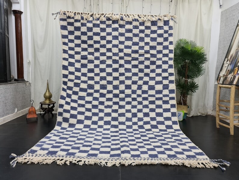 Handwoven Moroccan Rug 9.84 x 6.56 Feet 100% Sheep Wool: Handwoven Moroccan Rug 9.84 x 6.56 Feet 100% Sheep Wool Discover the beauty of this Elegant Soft Stunning Rug, handwoven in the Atlas Mountains by local Berber women weavers. Crafted with traditional