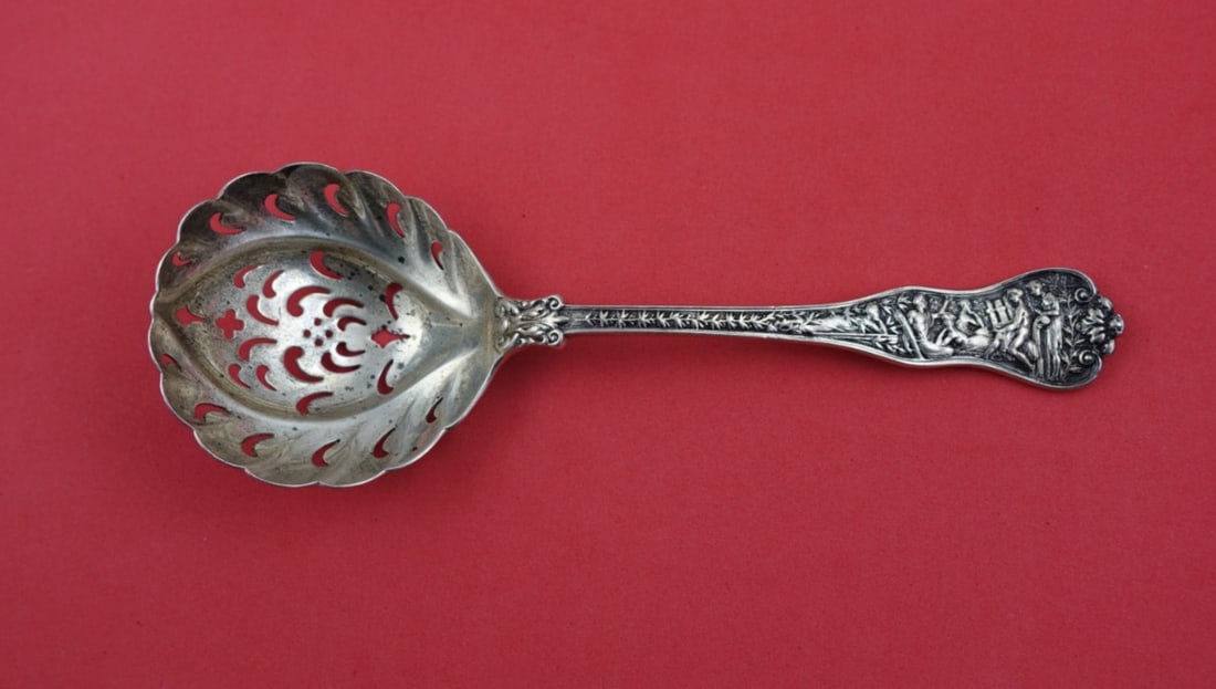 Tiffany & Co Olympian Sterling Silver Sugar Sifter 7.5 Scalloped Design: Tiffany & Co Olympian Sterling Silver Sugar Sifter 7.5 Scalloped Design Discover this exquisite Sterling Silver Sugar Sifter from the Olympian pattern by Tiffany & Co., crafted between 1850 and 1899.