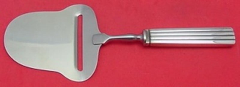 Georg Jensen Bernadotte Sterling Silver Cheese Plane 8 Inch: Georg Jensen Bernadotte Sterling Silver Cheese Plane 8 Inch Introducing the Bernadotte Cheese Plane by Georg Jensen, a stunning piece of sterling silver cutlery that embodies the rich heritage of Dani